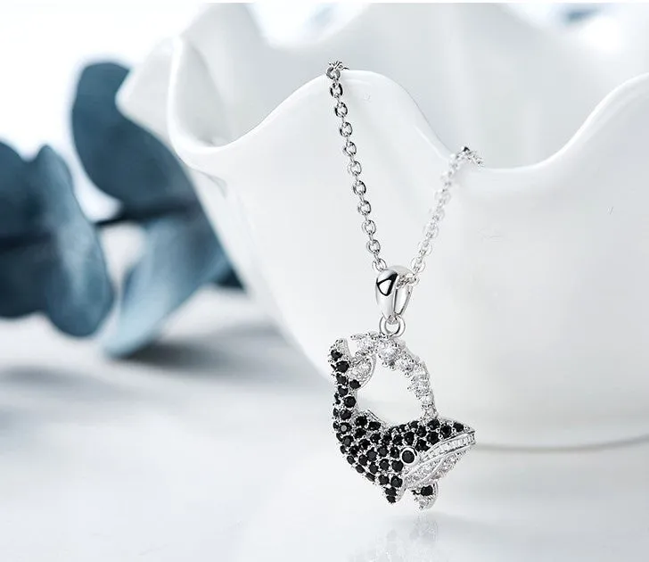 The black diamond whale necklace