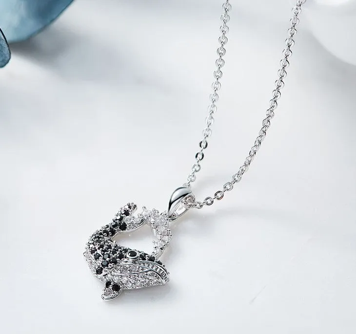 The black diamond whale necklace